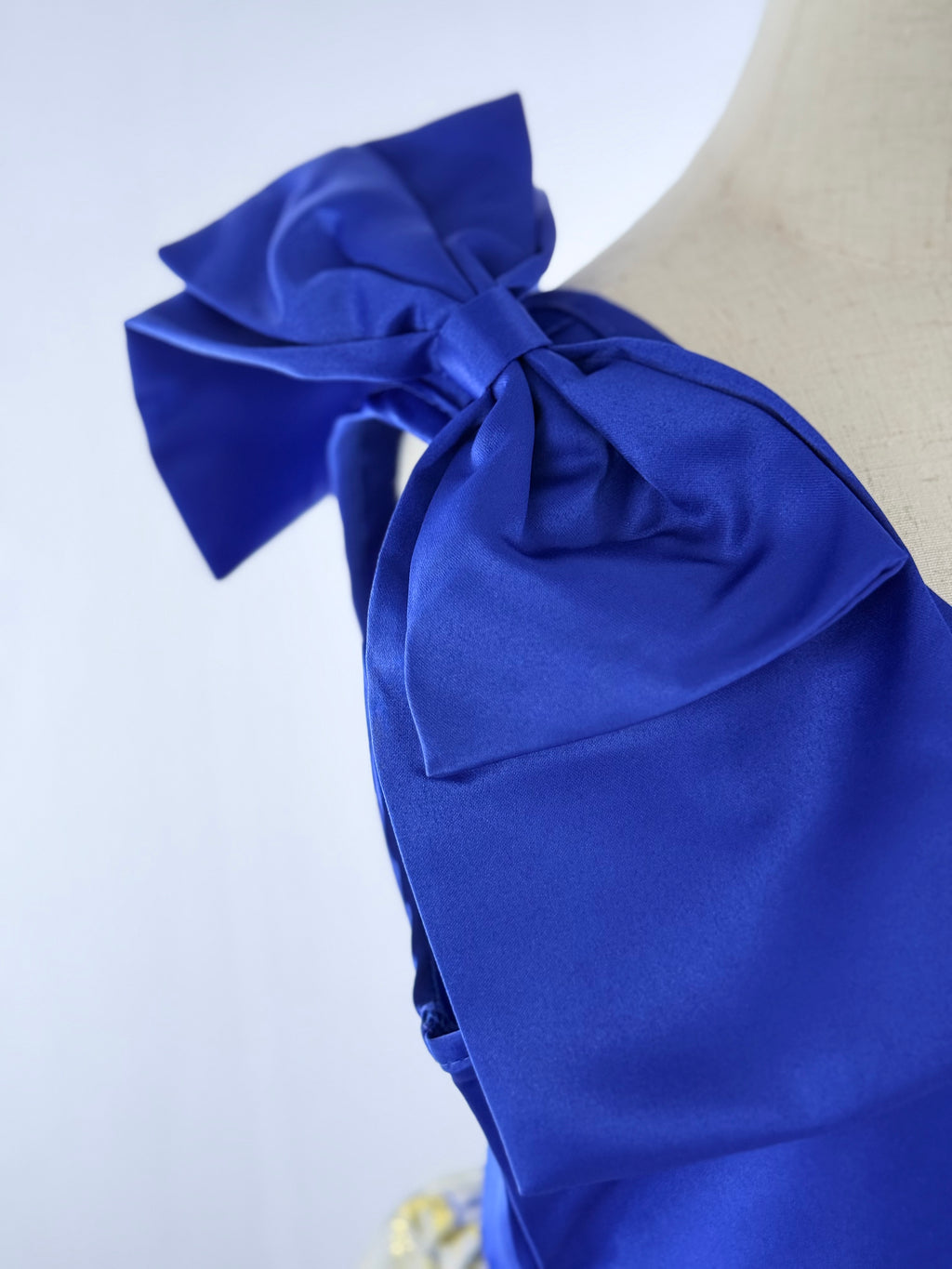 Close up of blue floral girls party dress, suitable for birthdays, weddings, parties, photoshoots and special occasions