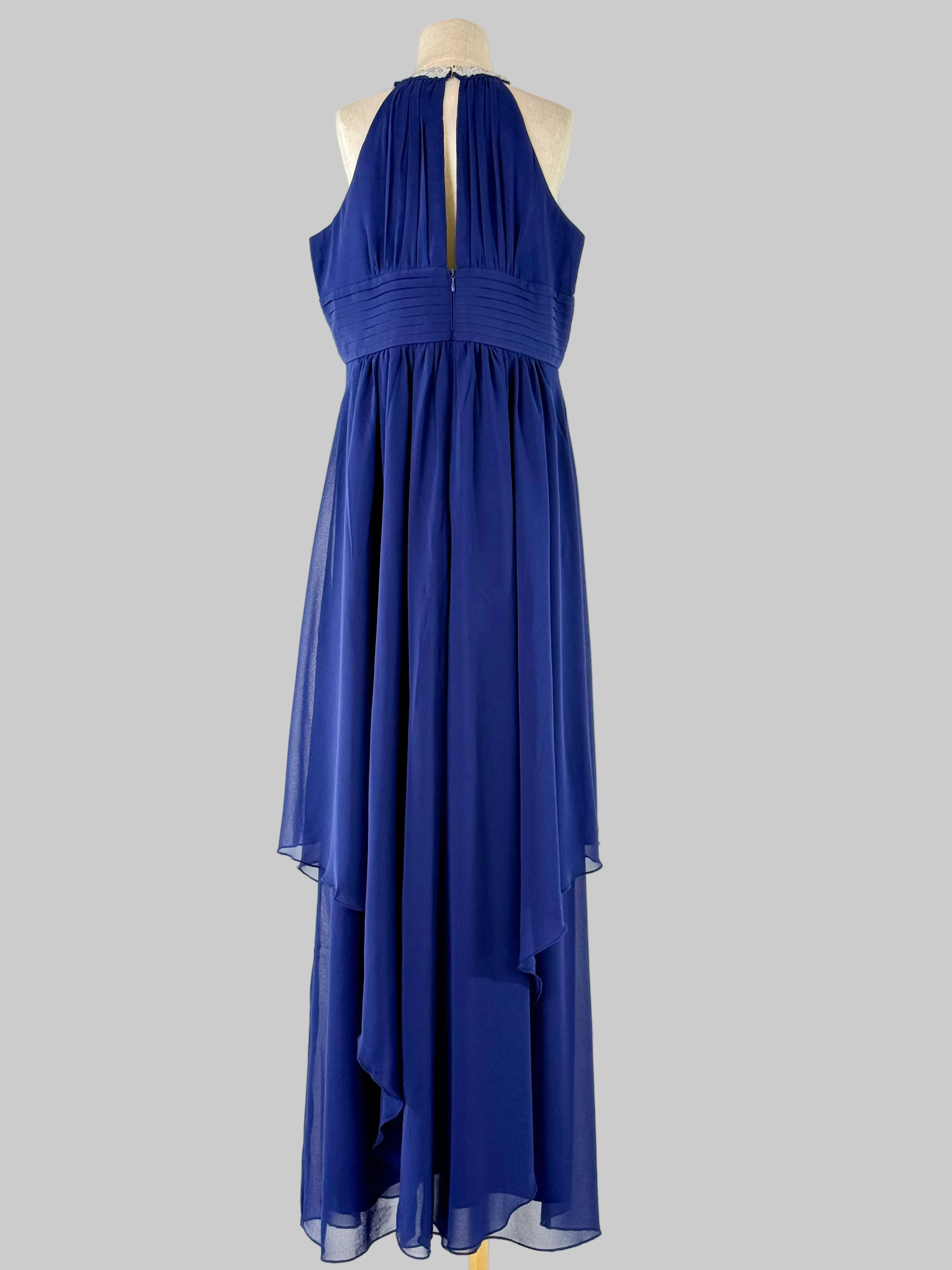 Back view of blue halter neck chiffon girls party dress, suitable for birthdays, bridesmaids, and formal occasions