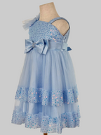 Side view of light blue tulle sequin one shoulder girls party dress, suitable for  birthdays, flower girls, photo shoots, formal occasions