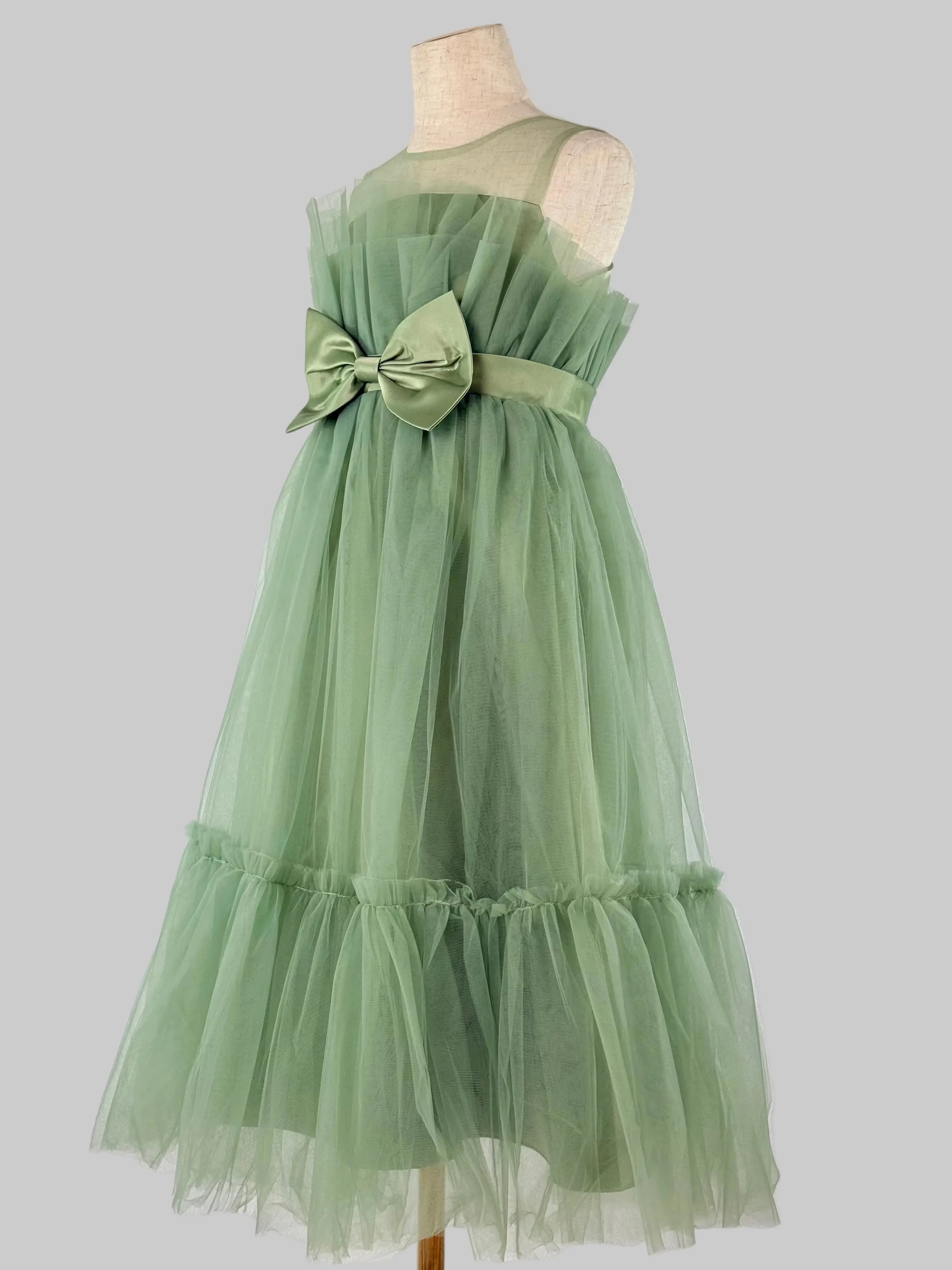Side view of sage green net tulle girls party dress, suitable for birthdays, flower girls, and formal occasions