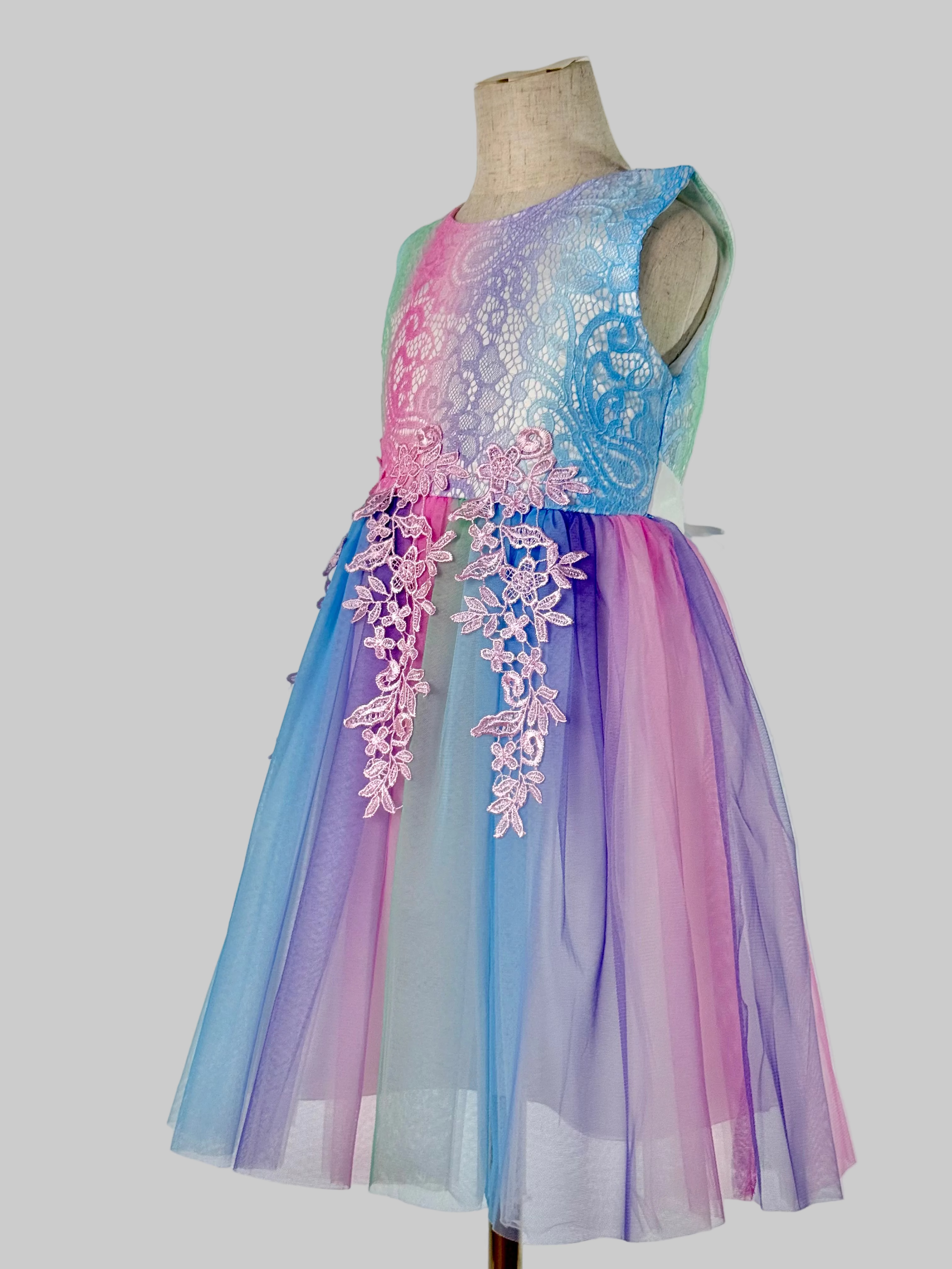Side view of pastel colour tulle girls party dress, suitable for  birthdays, flower girls, photo shoots, easter and holiday gatherings, formal occasions