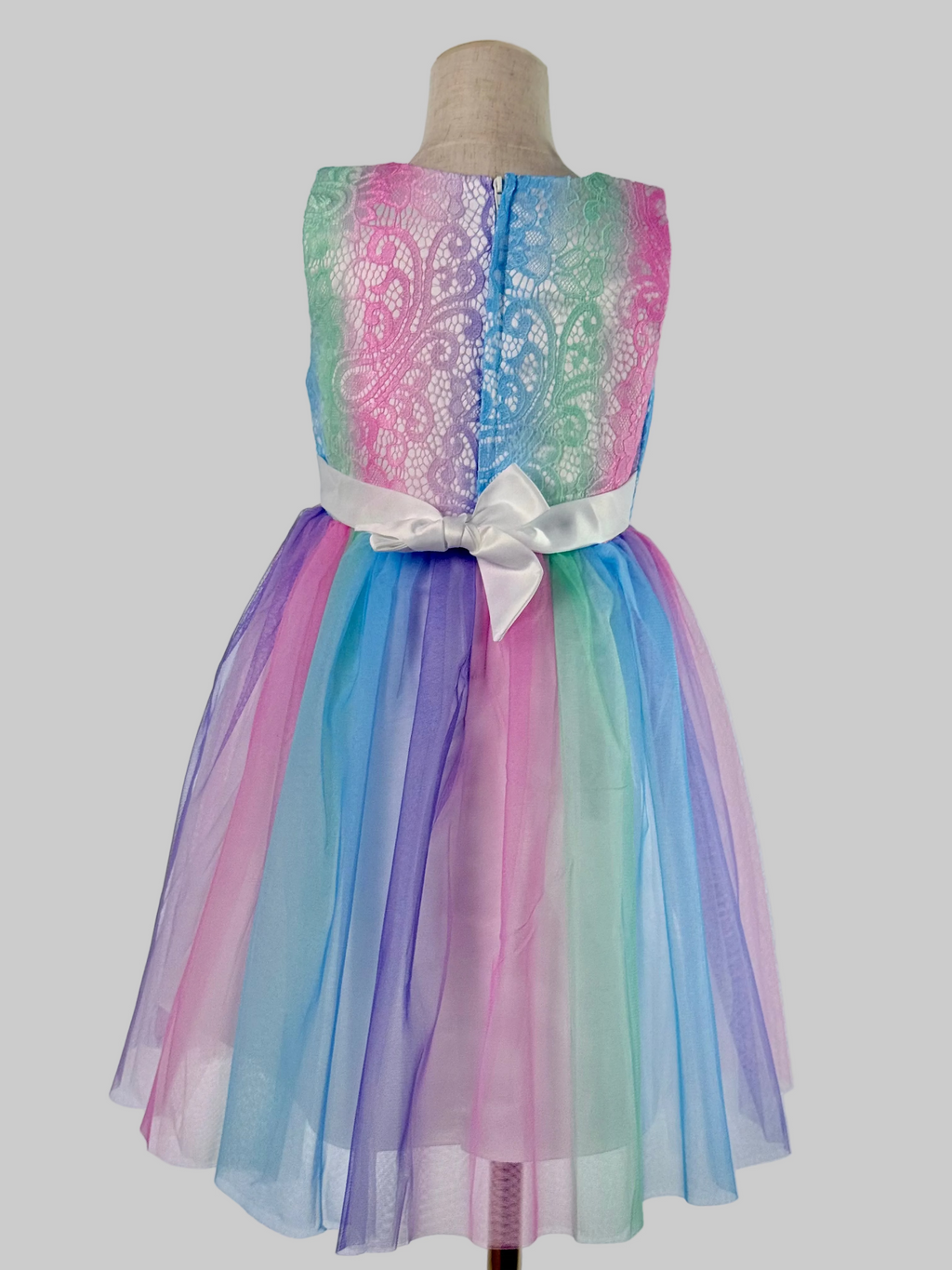 Back view of pastel colour tulle girls party dress, suitable for  birthdays, flower girls, photo shoots, easter and holiday gatherings, formal occasions