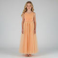 Front view of peach net tulle girls party dress, suitable for birthdays, flower girls, and formal occasions