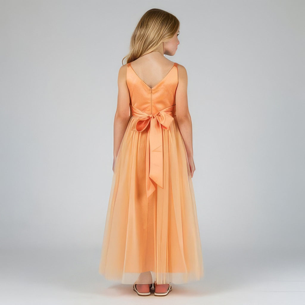 Back view of peach net tulle girls party dress, suitable for birthdays, flower girls, and formal occasions