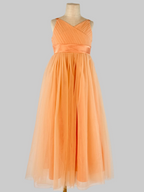 Front view of peach net tulle girls party dress, suitable for birthdays, flower girls, and formal occasions