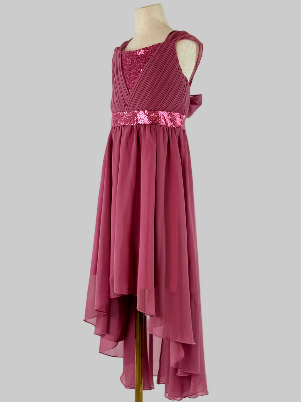 Side view of pink high-low chiffon girls party dress, suitable for birthdays, bridesmaids, and formal occasions