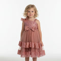 Front view of blush pink tulle sequin one shoulder girls party dress, suitable for  birthdays, flower girls, photo shoots, formal occasions