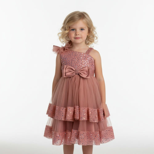 Front view of blush pink tulle sequin one shoulder girls party dress, suitable for  birthdays, flower girls, photo shoots, formal occasions