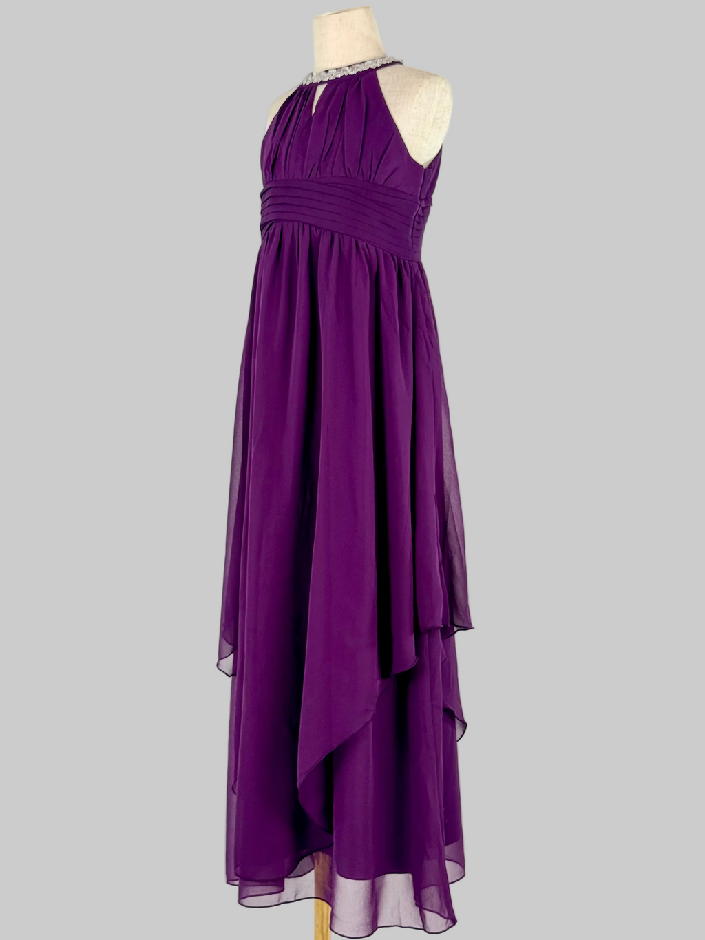 Side view of purple halter neck chiffon girls party dress, suitable for birthdays, bridesmaids, and formal occasions