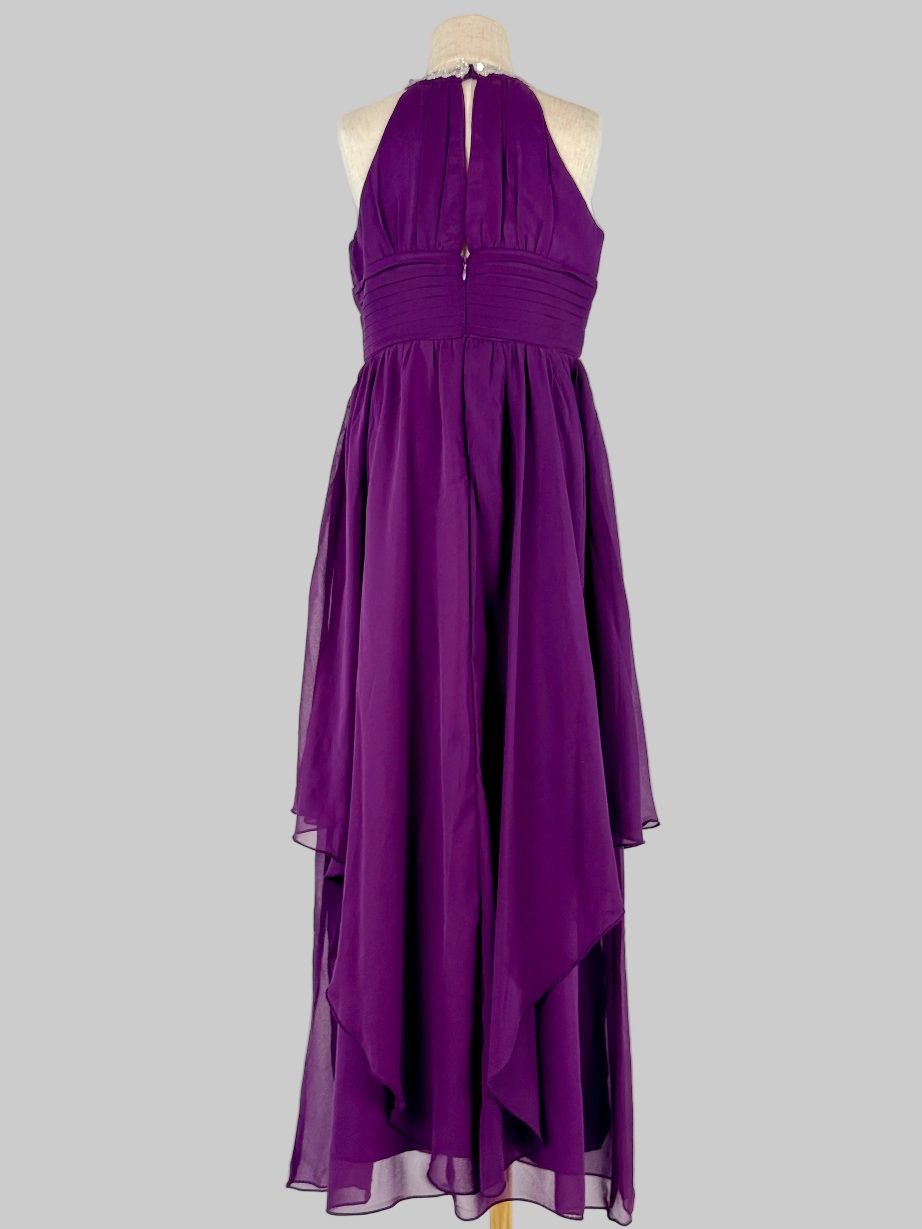 Back view of purple halter neck chiffon girls party dress, suitable for birthdays, bridesmaids, and formal occasions