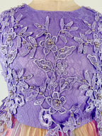 Closeup of purple tulle lace girls party dress, suitable for  birthdays, flower girls, photo shoots, formal occasions