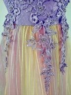 Closeup of purple tulle lace girls party dress, suitable for  birthdays, flower girls, photo shoots, formal occasions