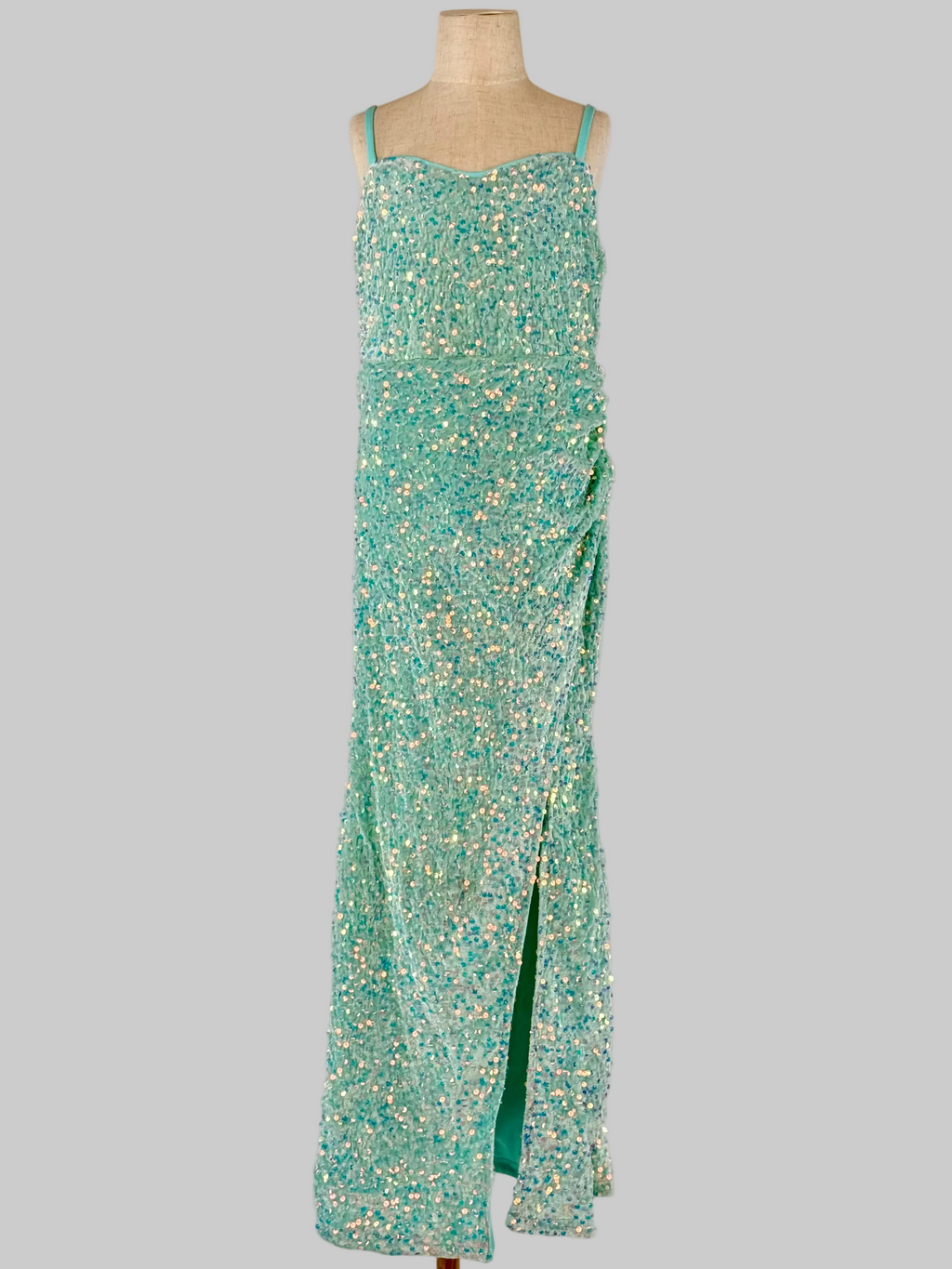 Front view of mint green sequin girls party dress, suitable for cocktails, birthdays, weddings or evening events