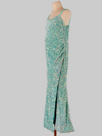 Side view of mint green sequin girls party dress, suitable for cocktails, birthdays, weddings or evening events