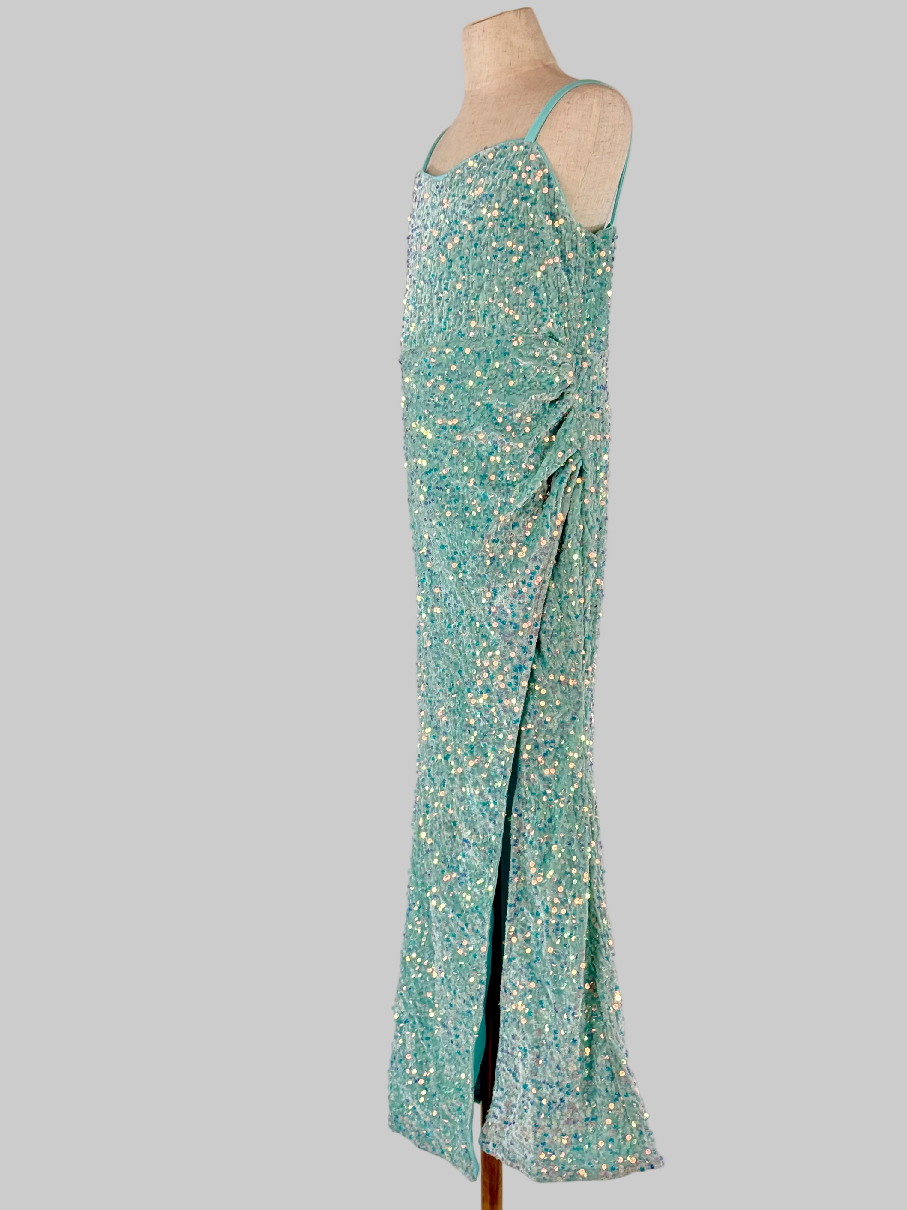 Side view of mint green sequin girls party dress, suitable for cocktails, birthdays, weddings or evening events