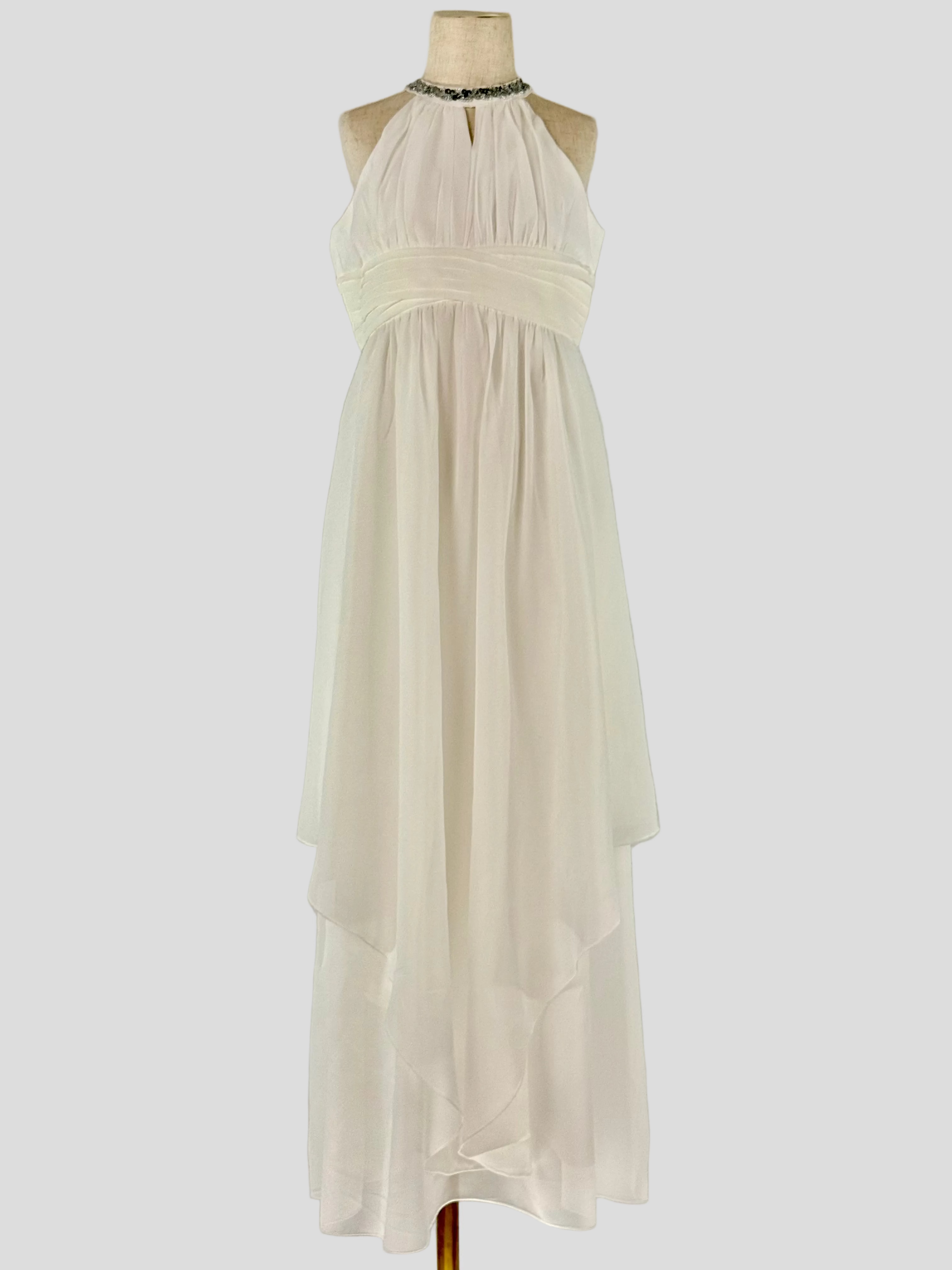 Front view of white halter neck chiffon girls party dress, suitable for birthdays, bridesmaids, and formal occasions