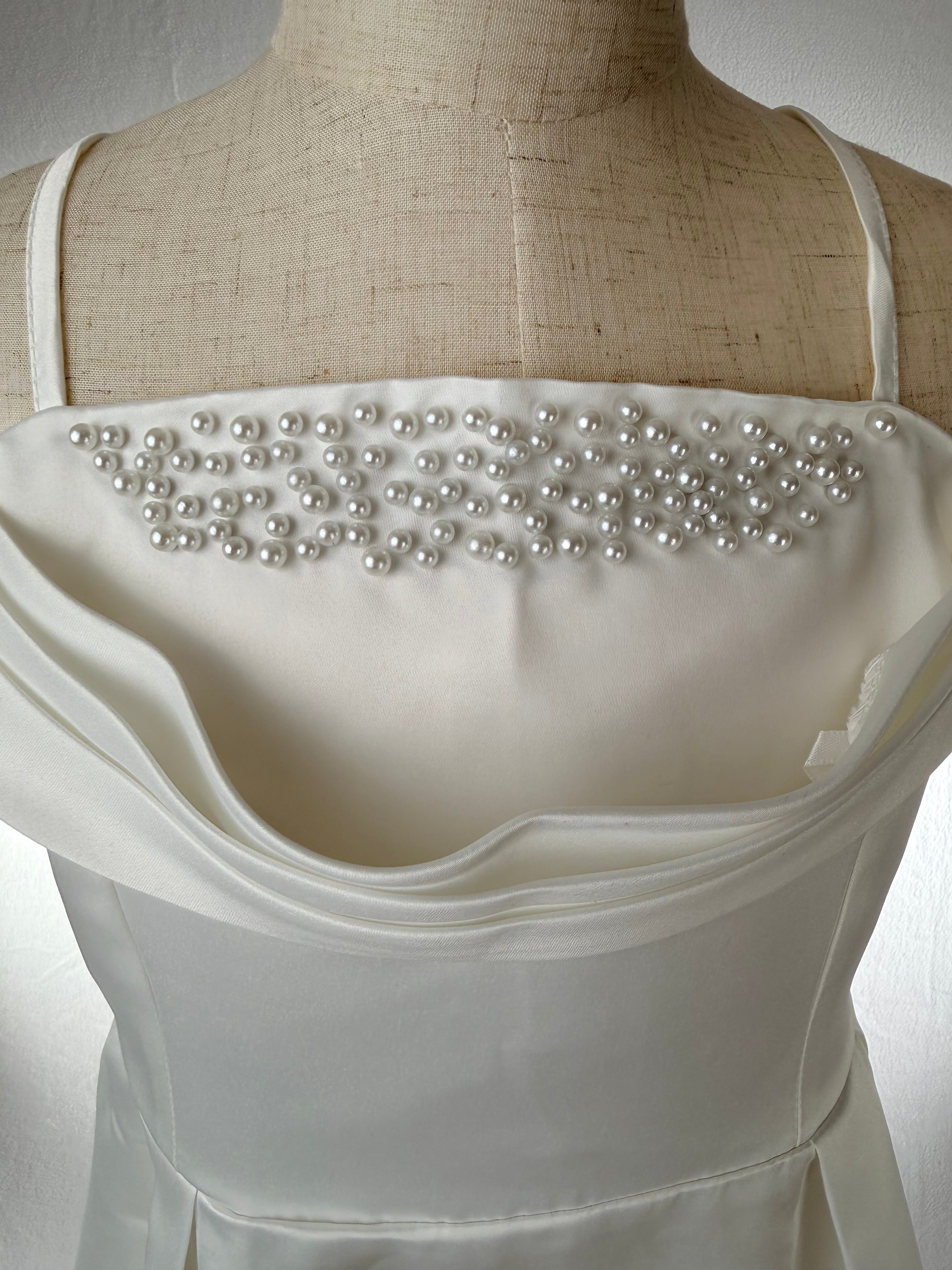 Closeup of white girls party dress, suitable for flower girls, birthdays, weddings, holy communion or graduation