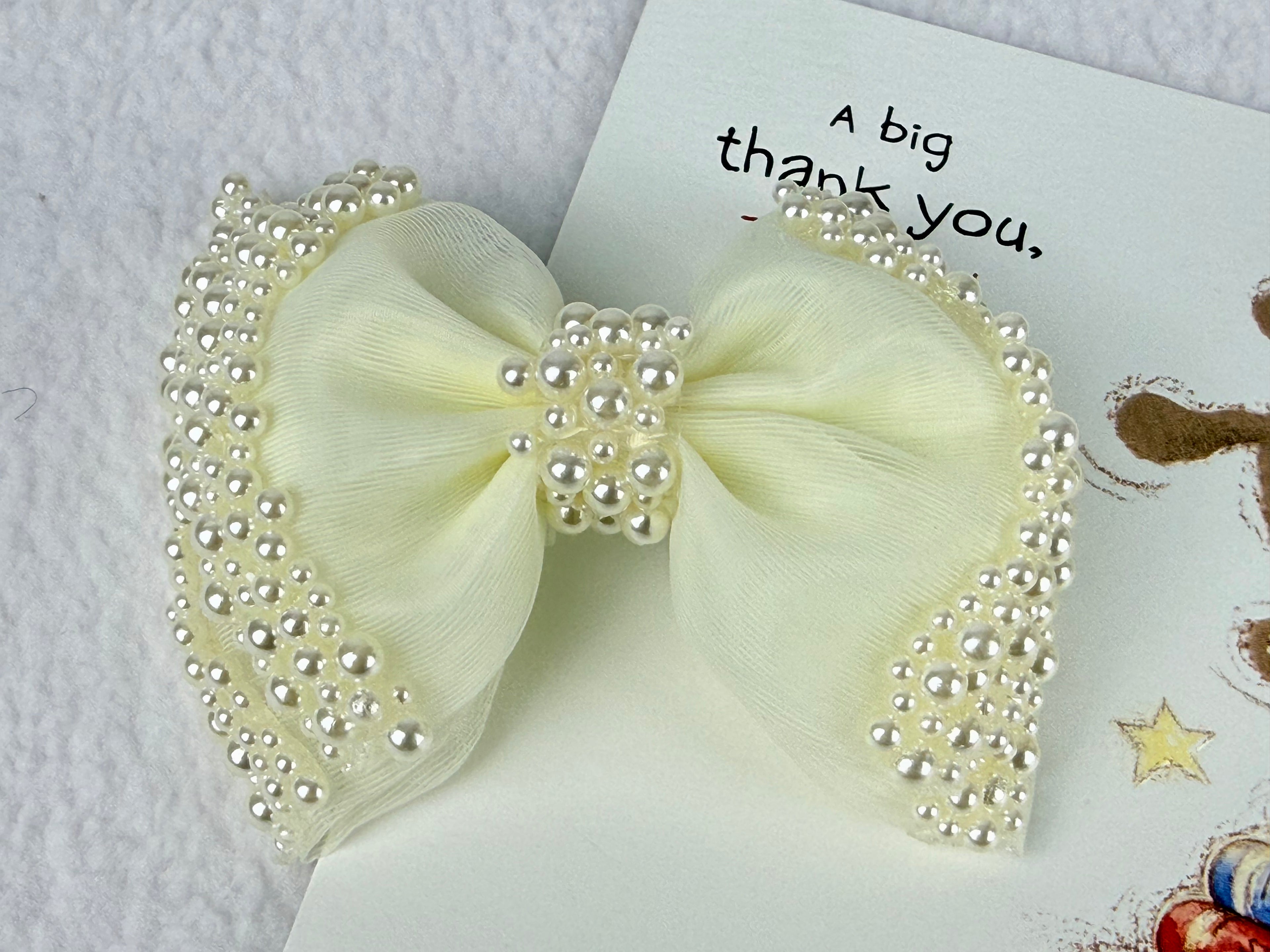 Girls pearl mesh bow knot hair clip. For birthdays, weddings, photoshoots.