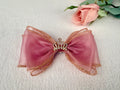 Girls pink mesh bow knot crown hair clip. For birthdays, weddings, photoshoots.