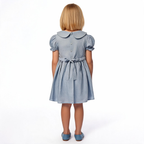 Back view of blue smocked dress. Suitable for birthdays, family gatherings, special occasions, or everyday.