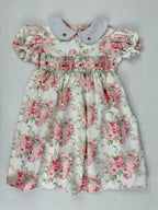 Front view of floral rose smocked dress. Suitable for birthdays, family gatherings, special occasions, or everyday.
