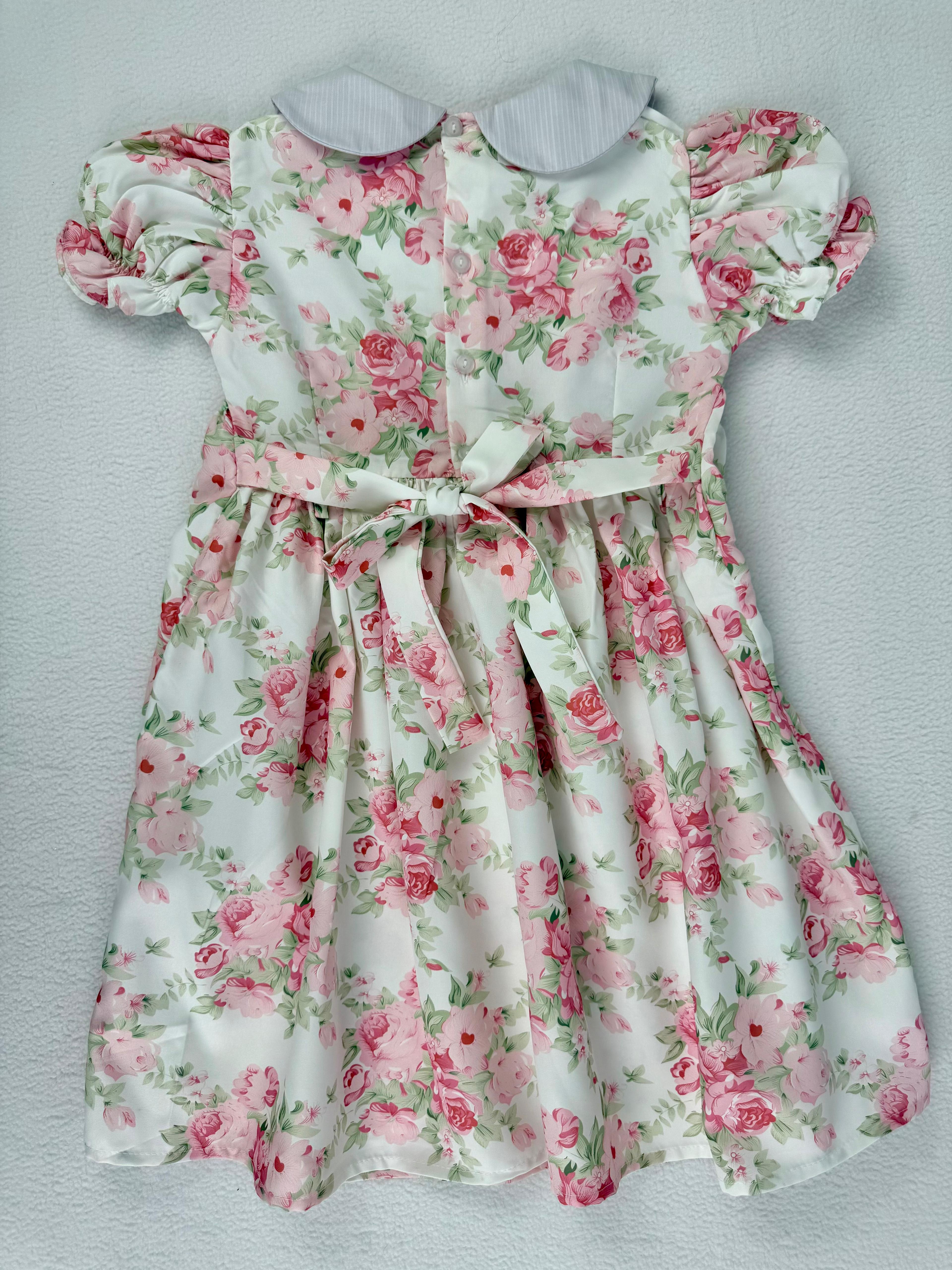 Back view of floral rose smocked dress. Suitable for birthdays, family gatherings, special occasions, or everyday.
