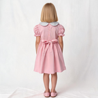 Back view of pink smocked dress. Suitable for birthdays, family gatherings, special occasions, or everyday.