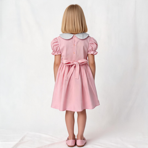 Back view of pink smocked dress. Suitable for birthdays, family gatherings, special occasions, or everyday.