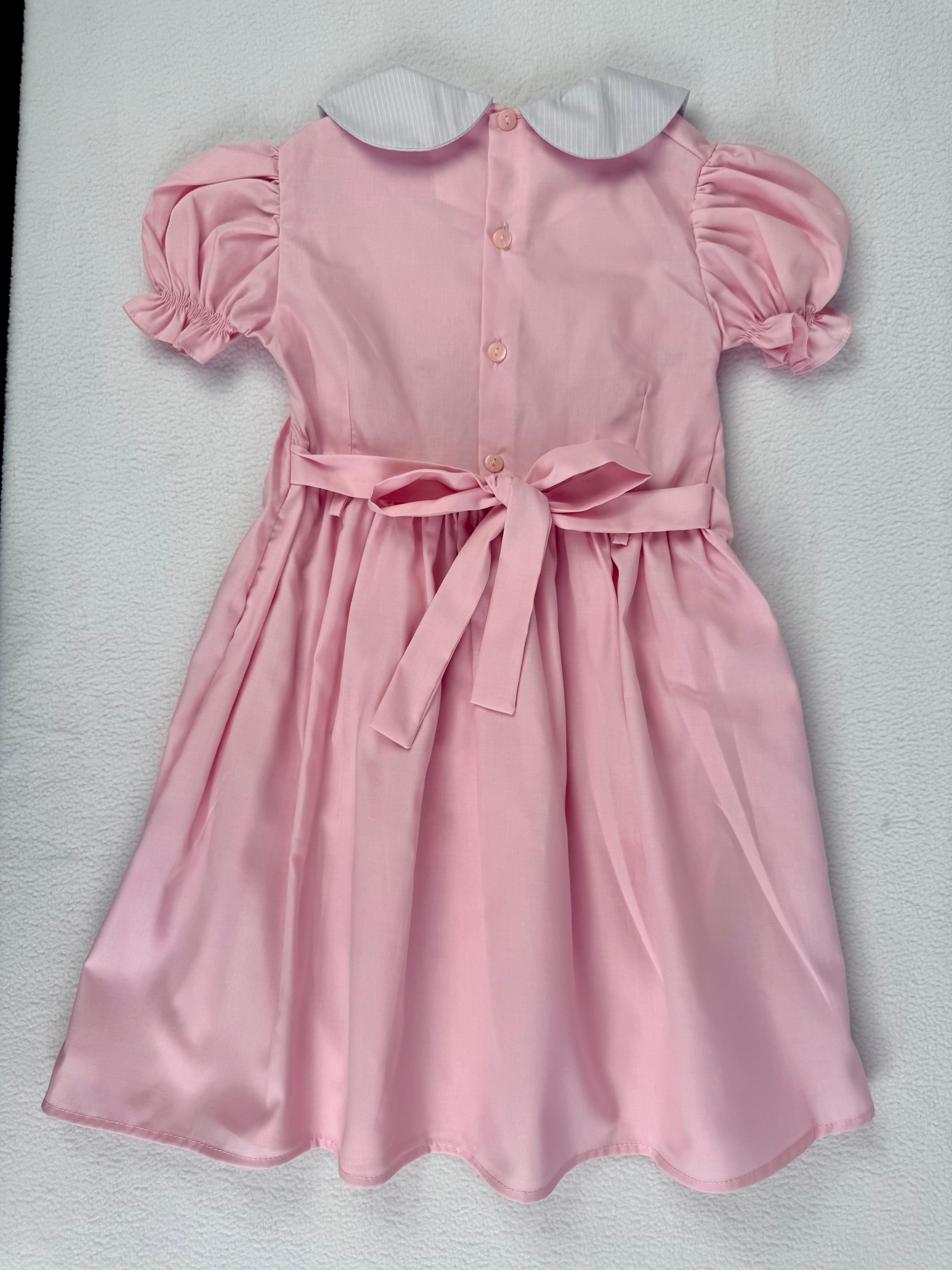 Back view of pink smocked dress. Suitable for birthdays, family gatherings, special occasions, or everyday.